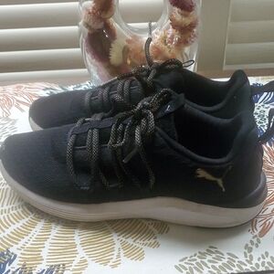 Puma Black Sneakers with Gold Accents